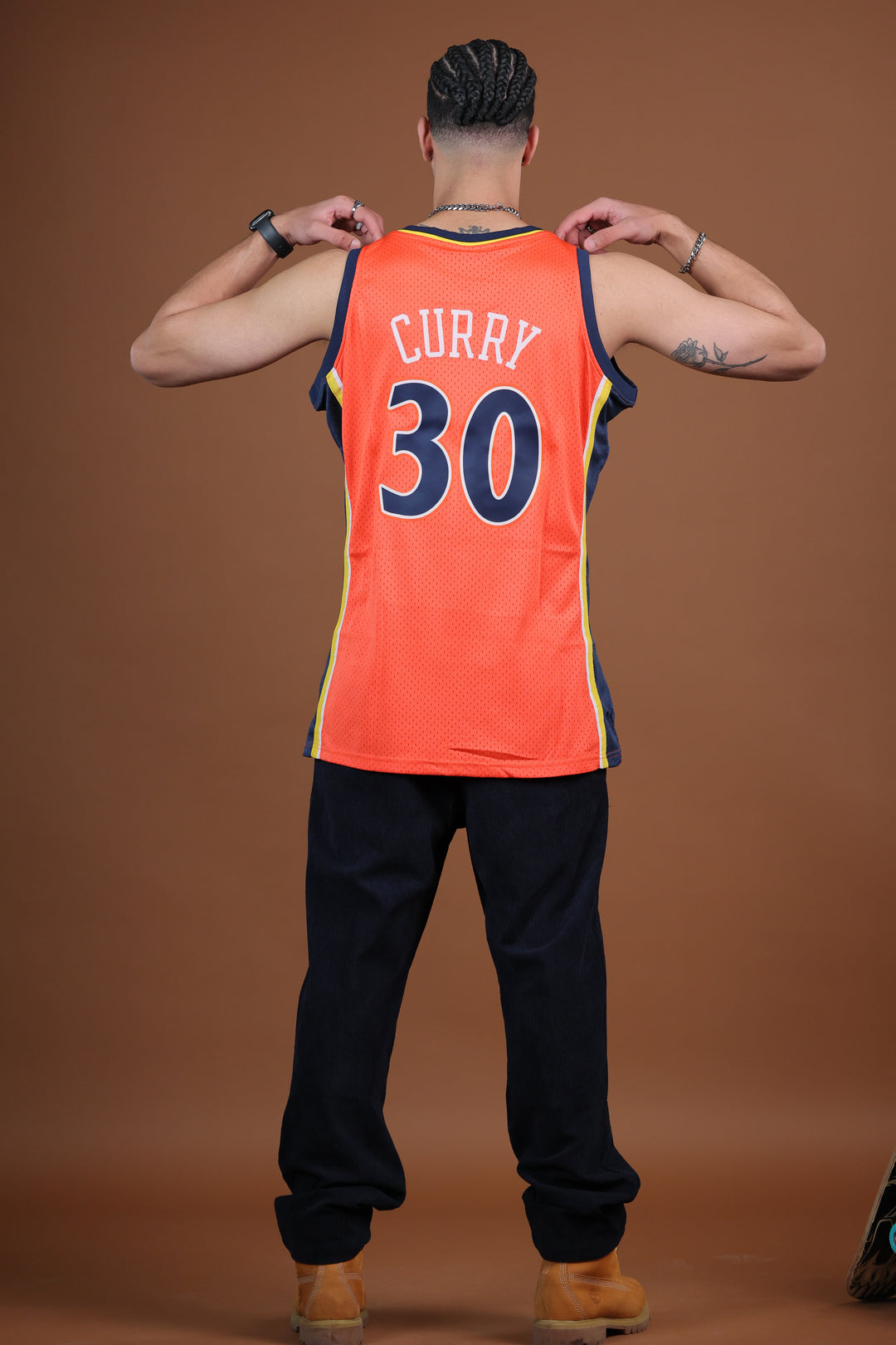 גופיית NBA סטפן קרי גולדן סטייט ווריורס – רטרו כתום 2009/10 | HOOPERS