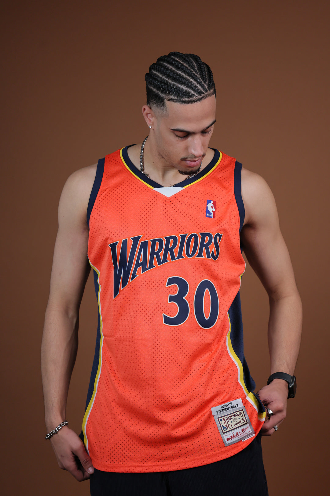 גופיית NBA סטפן קרי גולדן סטייט ווריורס – רטרו כתום 2009/10 | HOOPERS