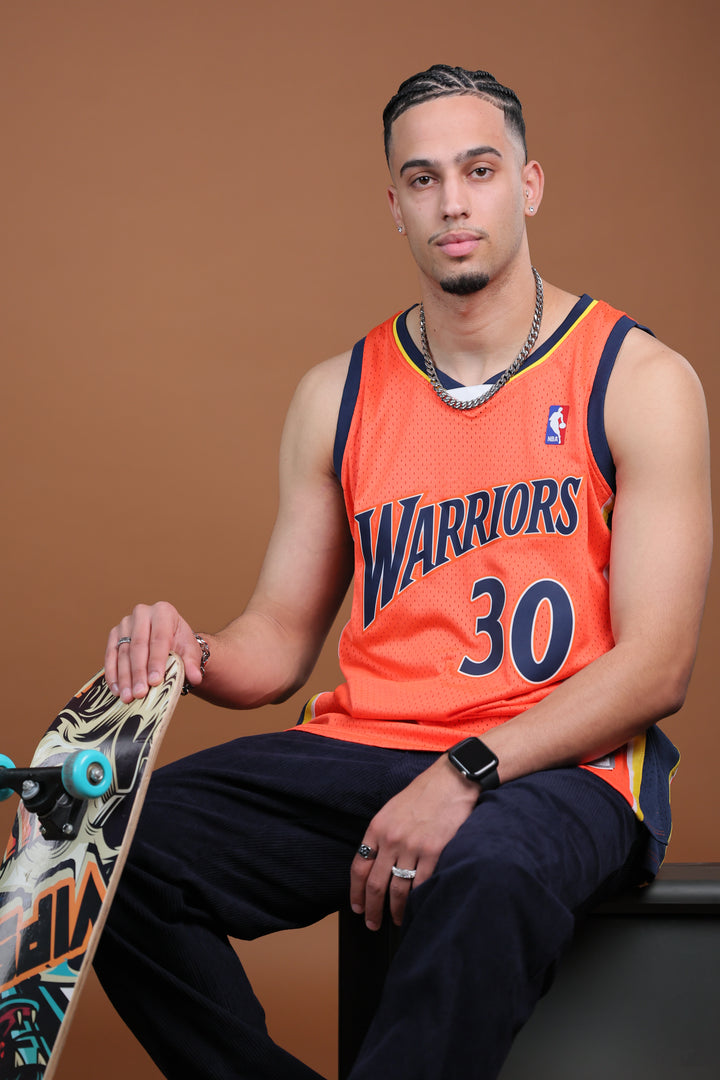 גופיית NBA סטפן קרי גולדן סטייט ווריורס – רטרו כתום 2009/10 | HOOPERS