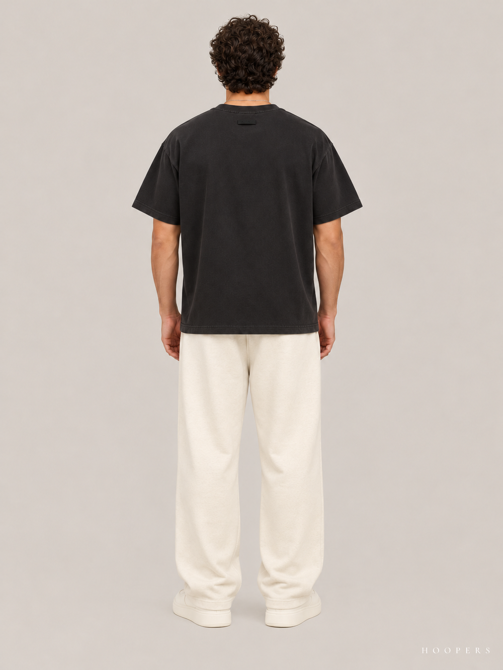 חולצת Fear of God Essentials – Arch Logo שחור דהוי – גב