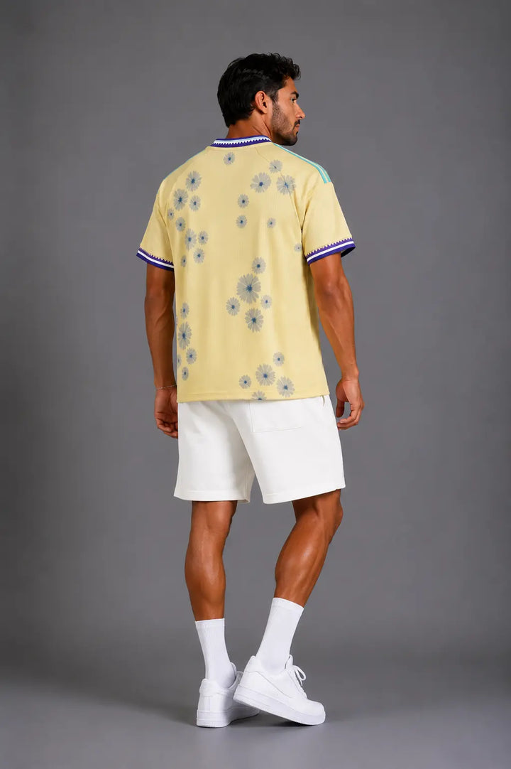 חולצת גרמניה מונדיאל – Floral Heritage Edition (שמנת/סגול) | HOOPERS