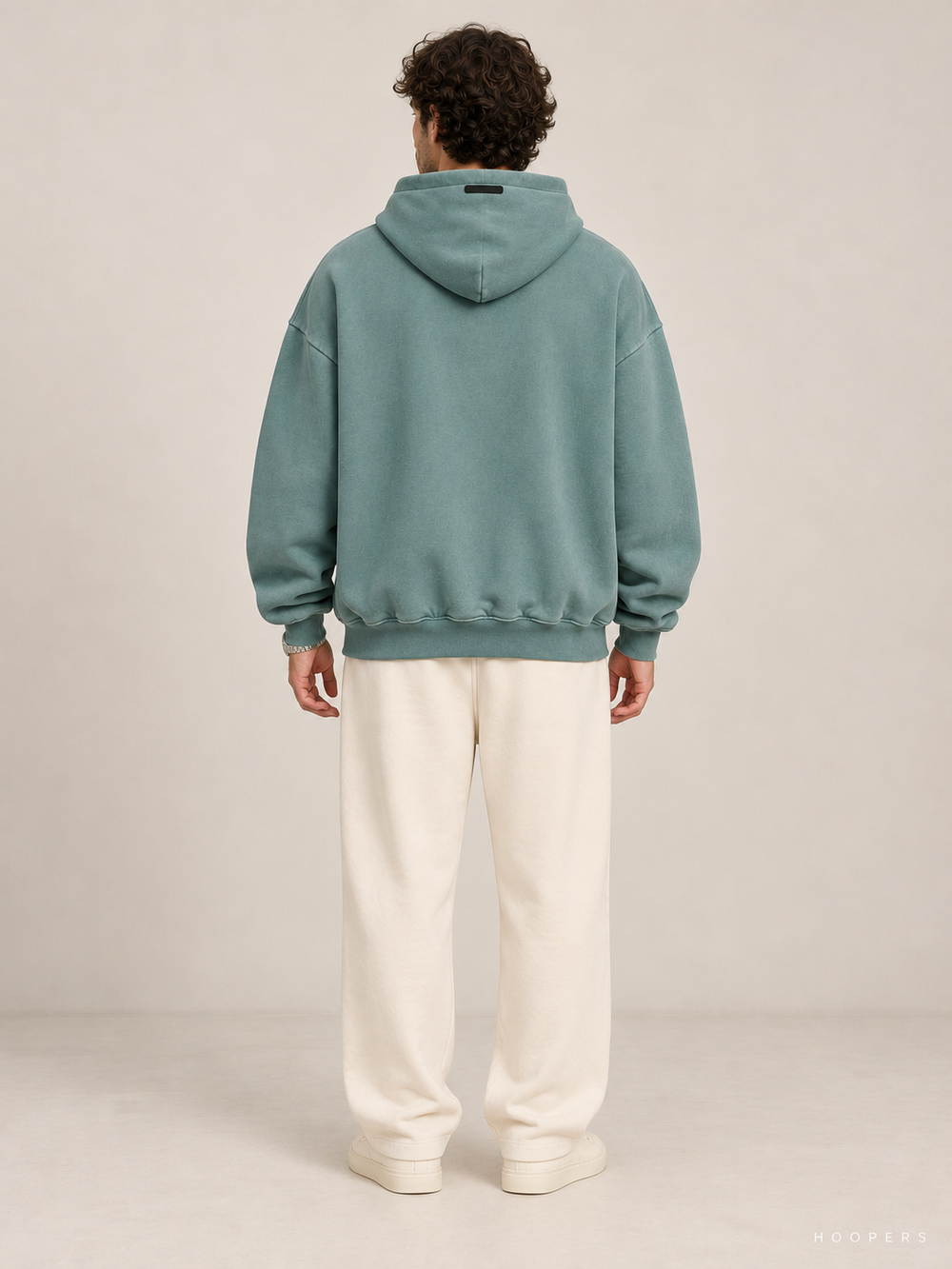 קפוצ'ון Fear of God Essentials – Arch Logo טורקיז מכובס – גב