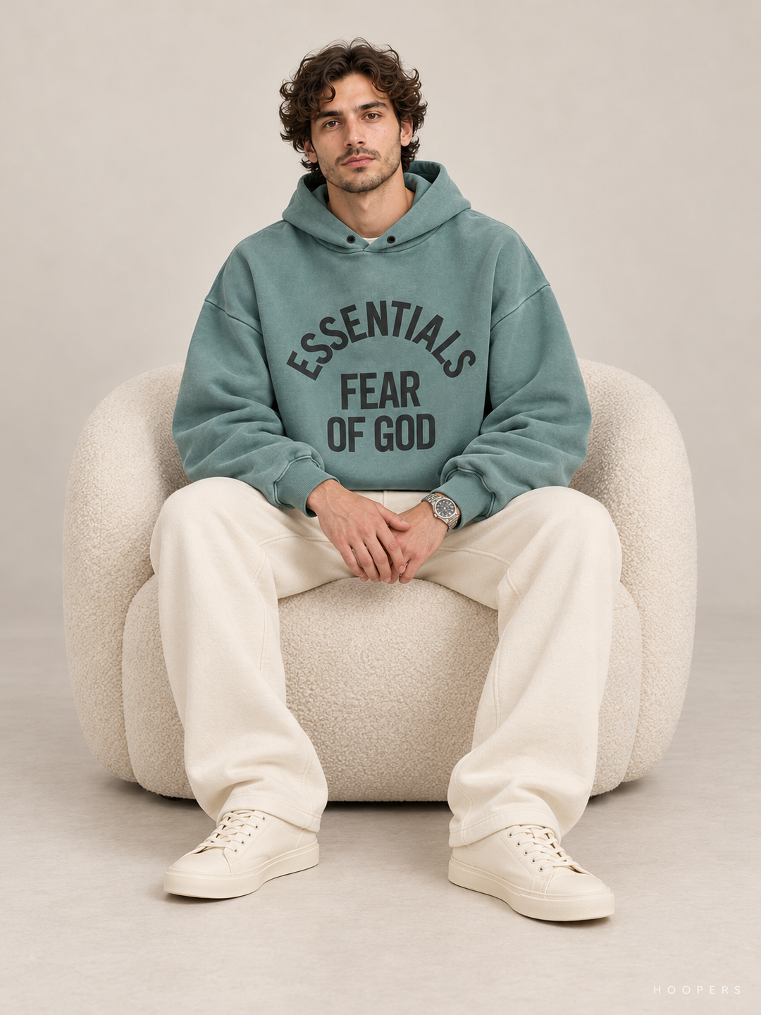 קפוצ'ון Fear of God Essentials – Arch Logo טורקיז מכובס – סטודיו