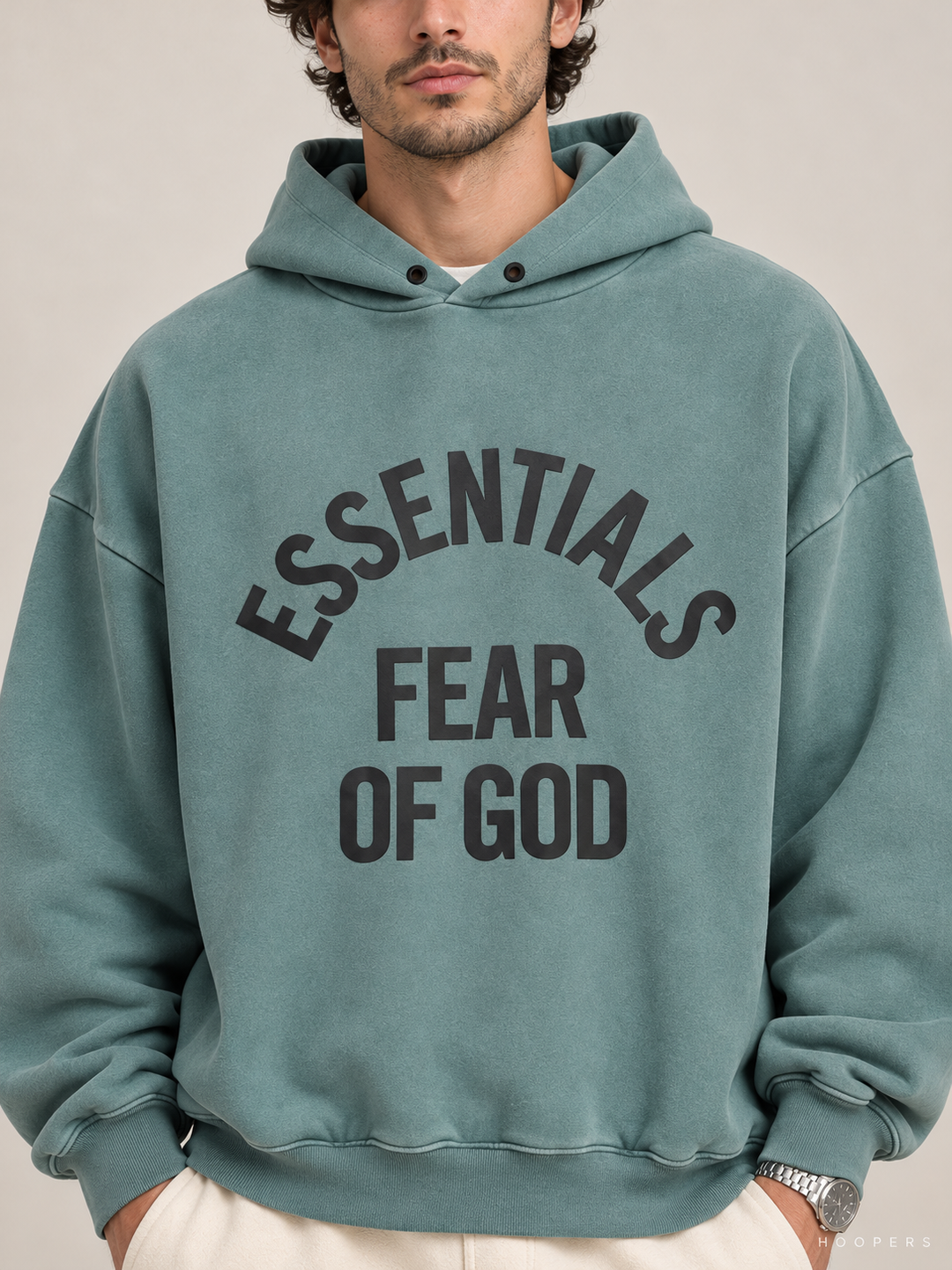 קפוצ'ון Fear of God Essentials – Arch Logo טורקיז מכובס – תקריב