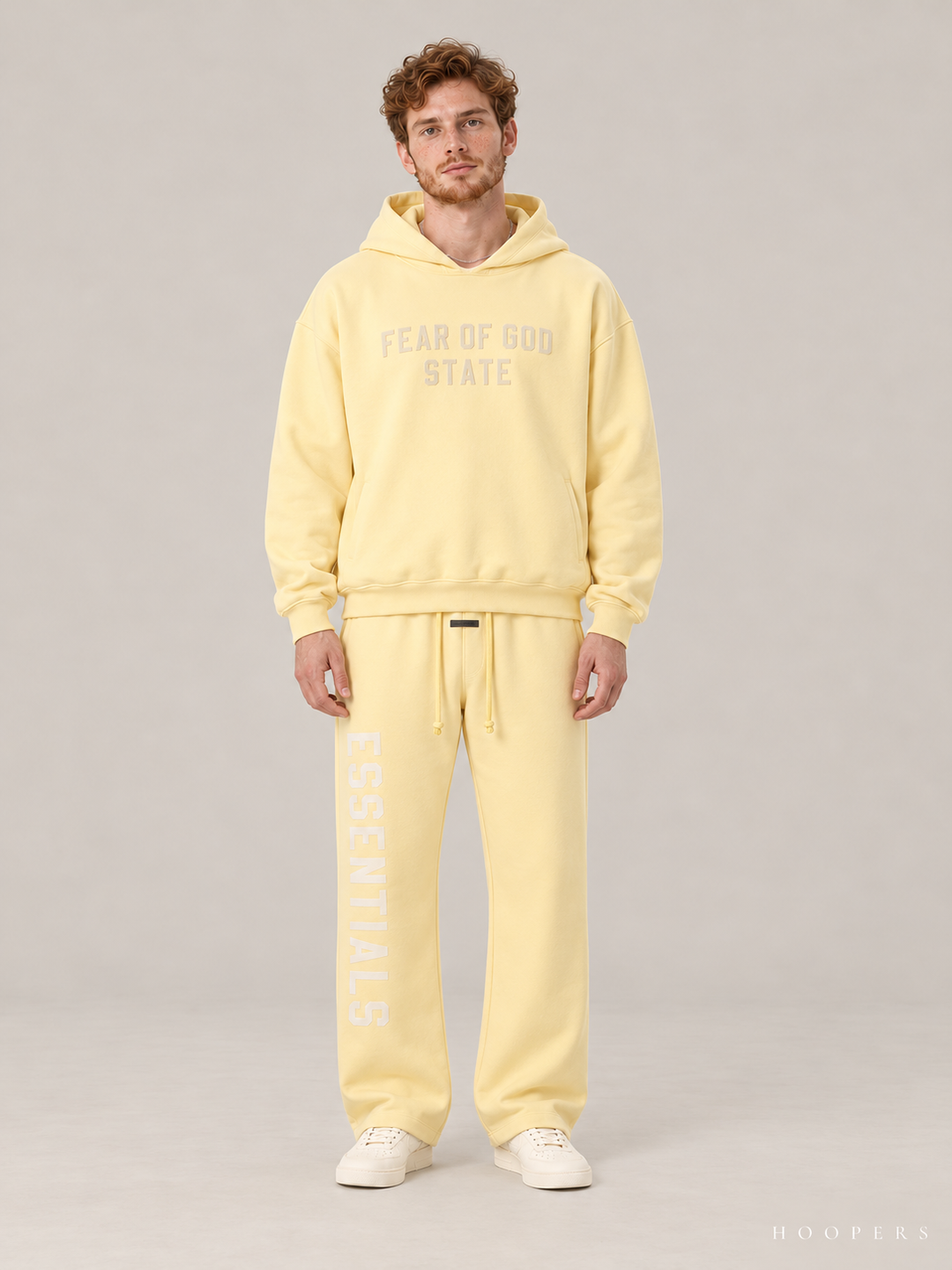 קפוצ'ון Fear of God Essentials – STATE צהוב חמאה – חזית