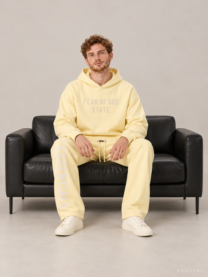 קפוצ'ון Fear of God Essentials – STATE צהוב חמאה – סטודיו
