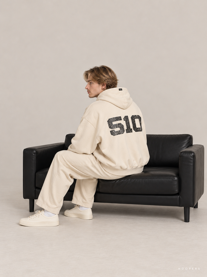 קפוצ'ון Fear of God Essentials – Panther 510 שמנת – סטודיו