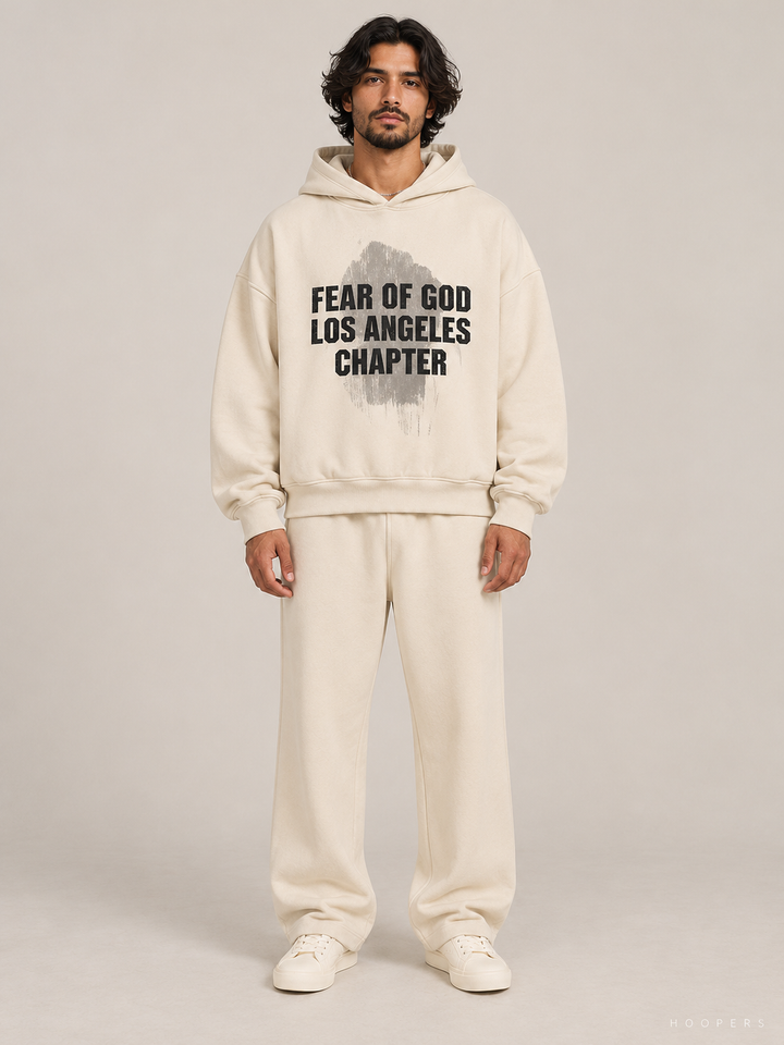 קפוצ'ון Fear of God Essentials – LA Chapter 213 שמנת – חזית