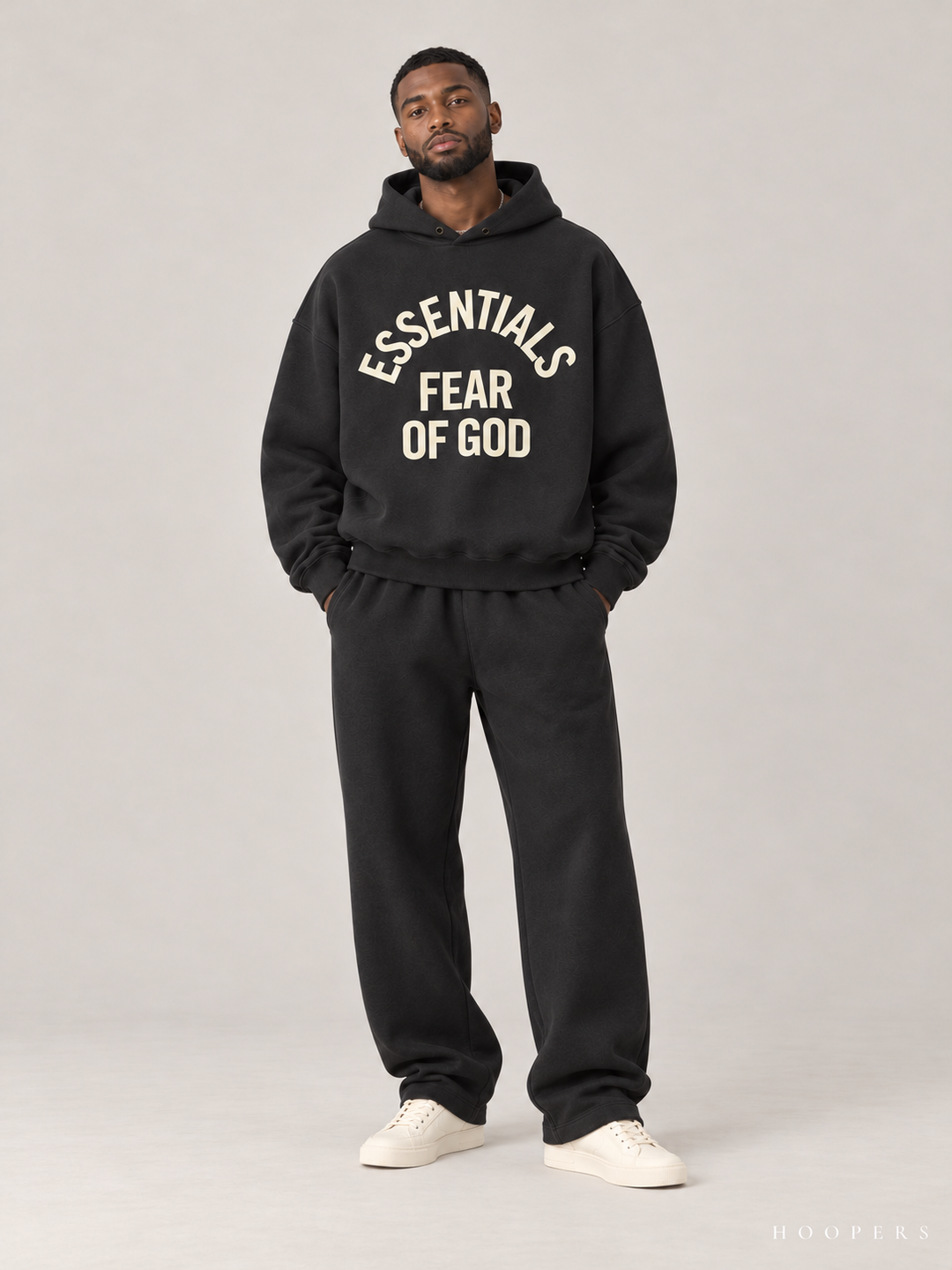 קפוצ'ון Fear of God Essentials – Arch Logo שחור דהוי – חזית
