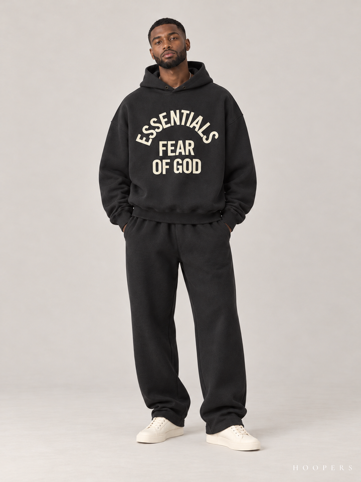 קפוצ'ון Fear of God Essentials – Arch Logo שחור דהוי – חזית