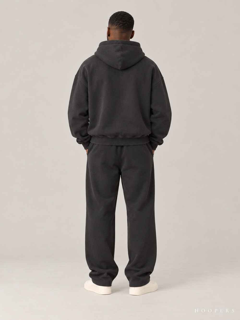 קפוצ'ון Fear of God Essentials – Arch Logo שחור דהוי – גב
