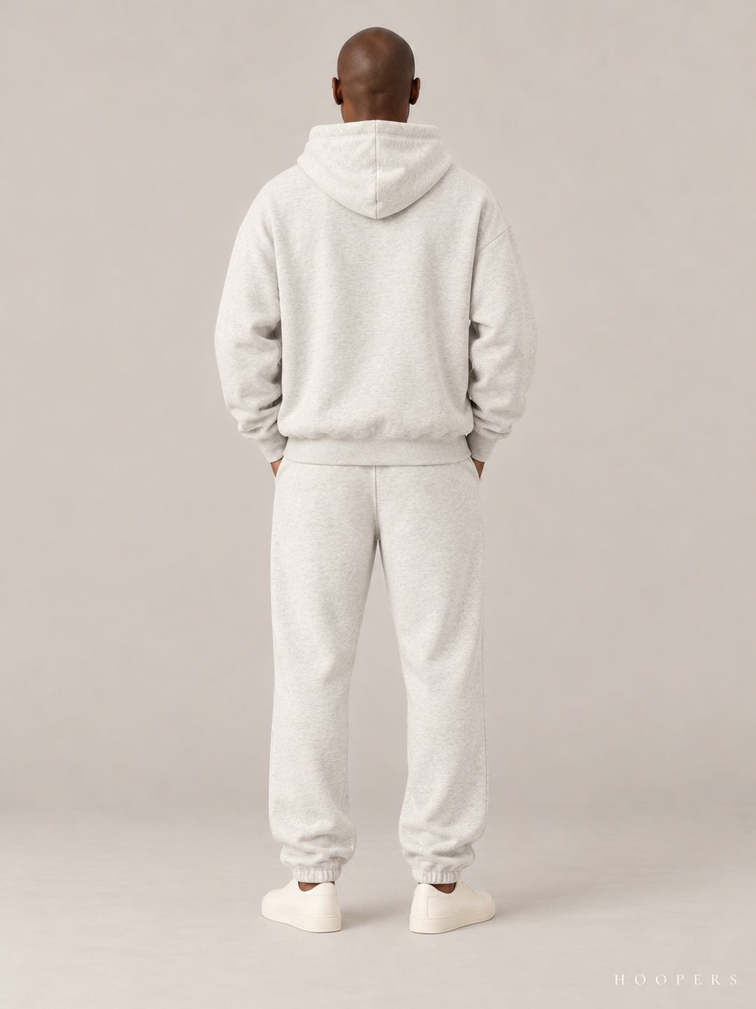 קפוצ'ון Fear of God Essentials – Script שמנת מלאנז' – גב