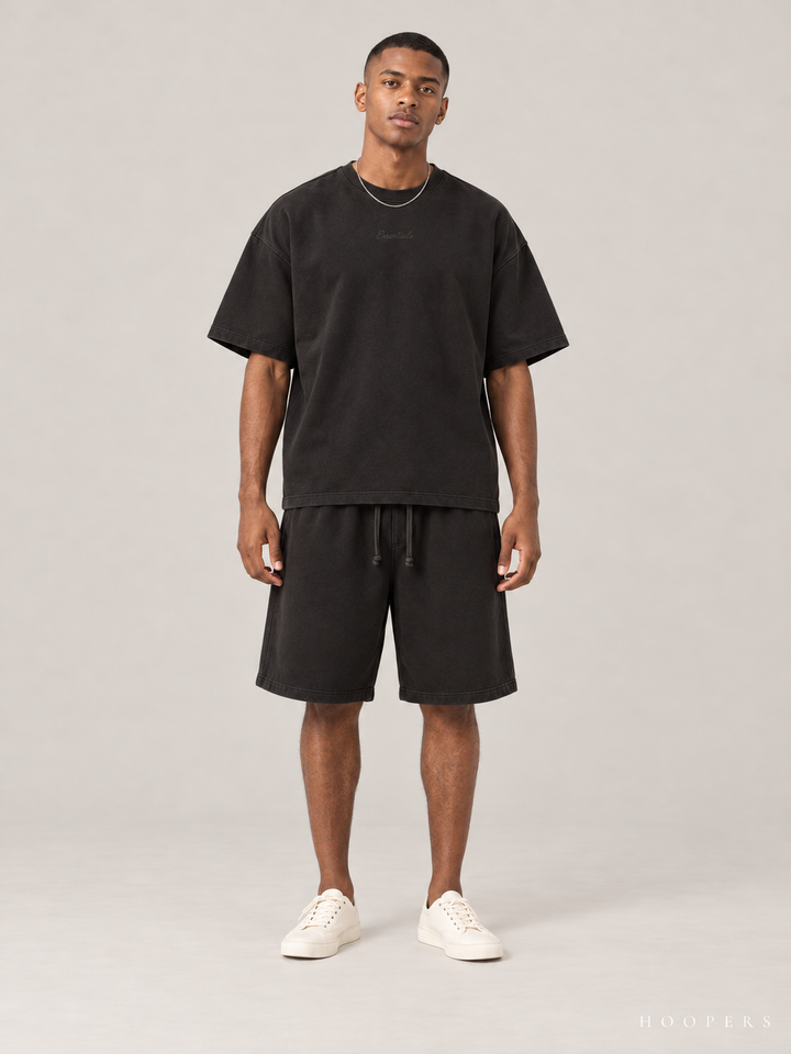 חולצת Fear of God Essentials – Script שחור דהוי – חזית