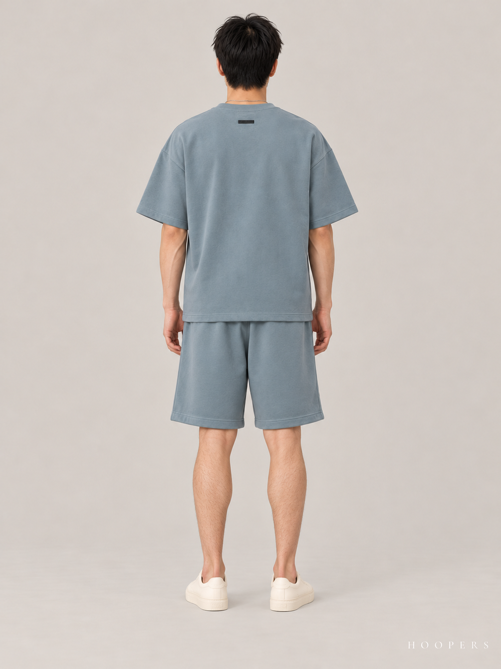 חולצת Fear of God Essentials – Script כחול אפרפר – גב