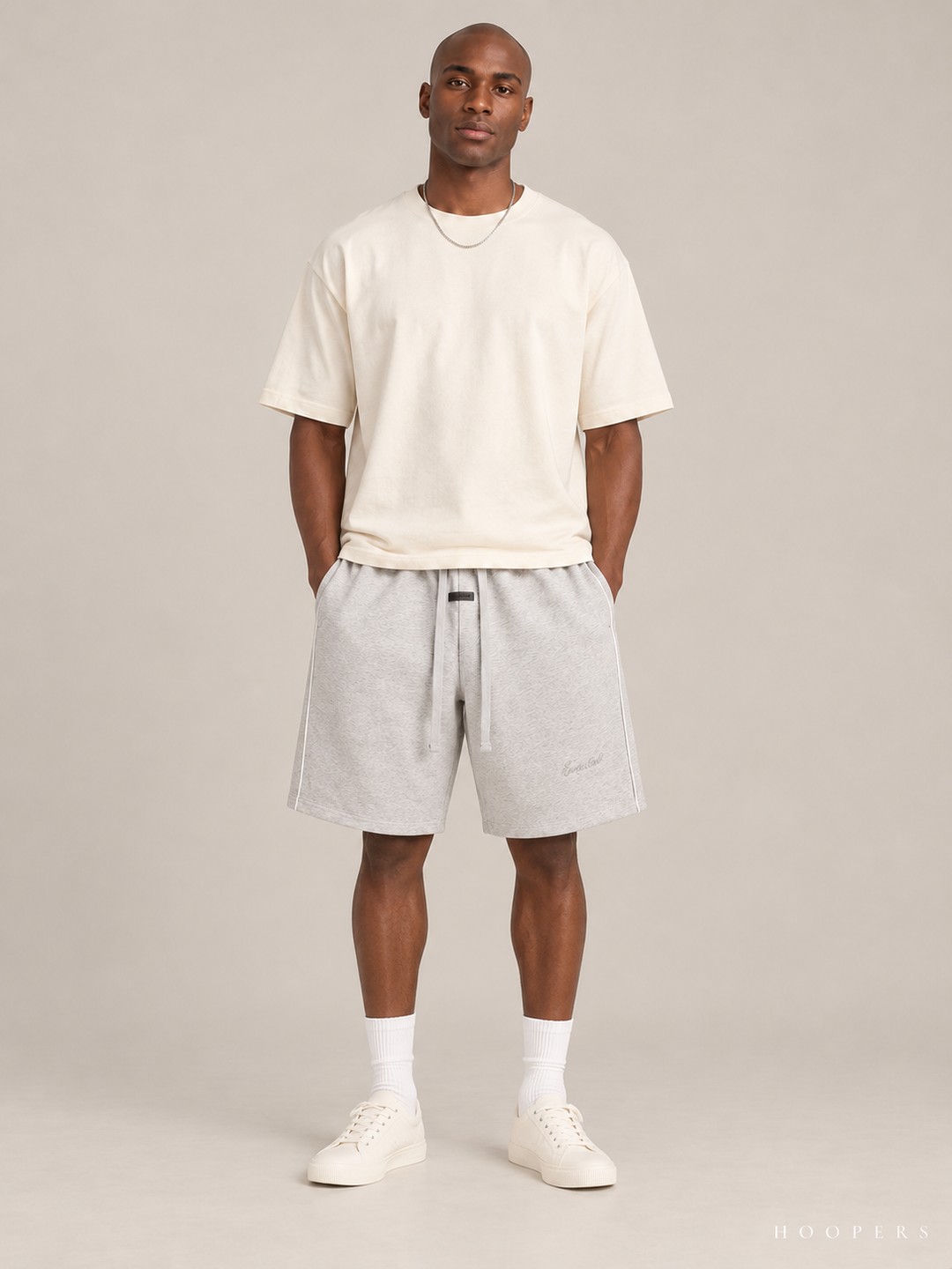מכנס קצר Fear of God Essentials – Piping אפור מלאנז' בהיר – חזית