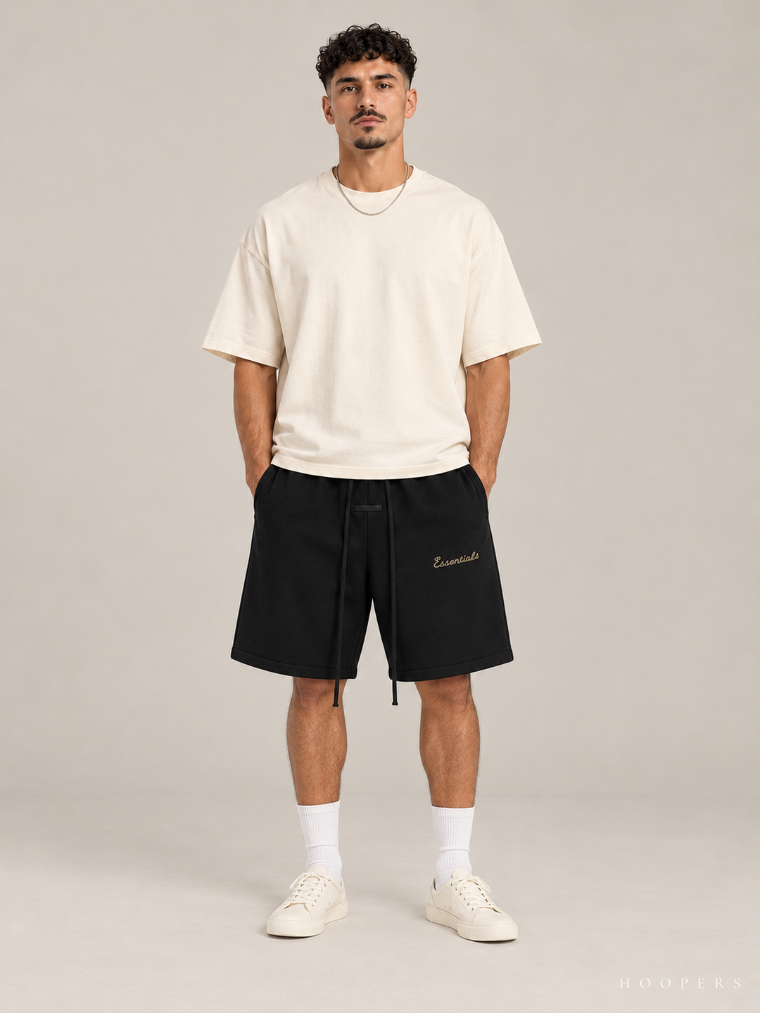 מכנס קצר Fear of God Essentials – Gold Script שחור – חזית