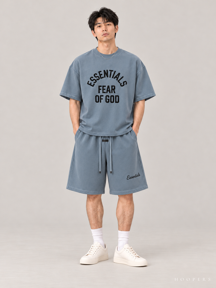 חולצת Fear of God Essentials – Arch Logo כחול אפרפר – חזית