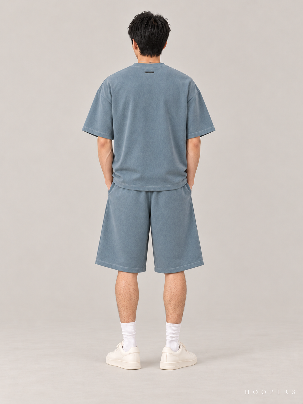 חולצת Fear of God Essentials – Arch Logo כחול אפרפר – גב