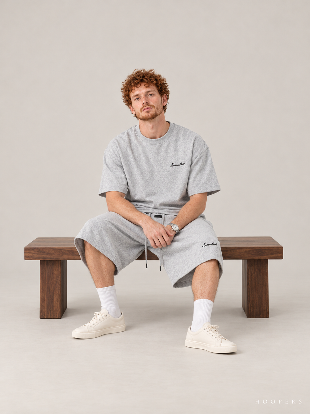 חולצת Fear of God Essentials – Script אפור מלאנז' בהיר | HOOPERS
