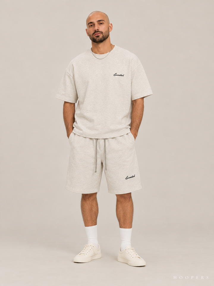 חולצת Fear of God Essentials – Script שמנת מלאנז' – חזית