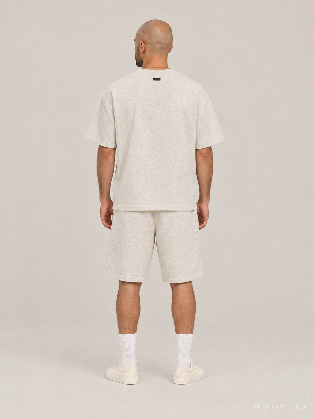 חולצת Fear of God Essentials – Script שמנת מלאנז' – גב