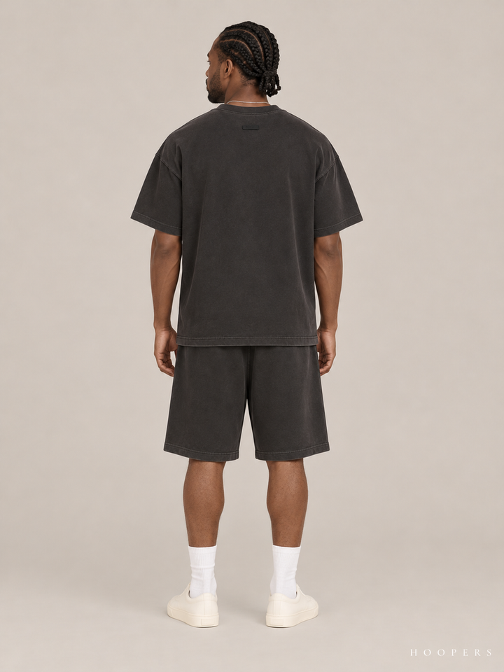 חולצת Fear of God Essentials – Big Script שחור דהוי – גב