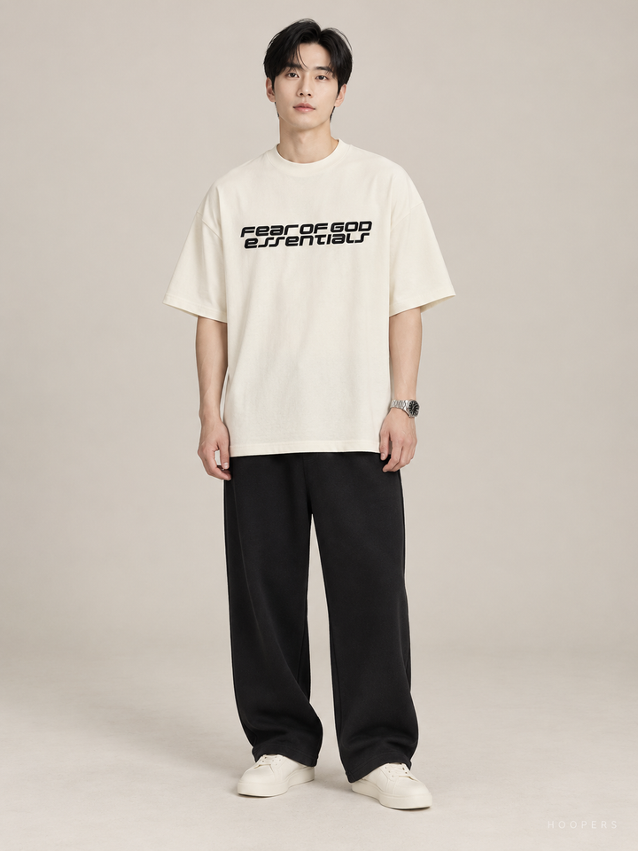 חולצת אוברסייז Fear of God Essentials – Racing שמנת – חזית