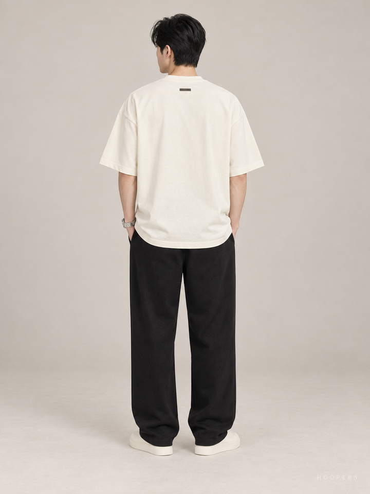 חולצת אוברסייז Fear of God Essentials – Racing שמנת – גב