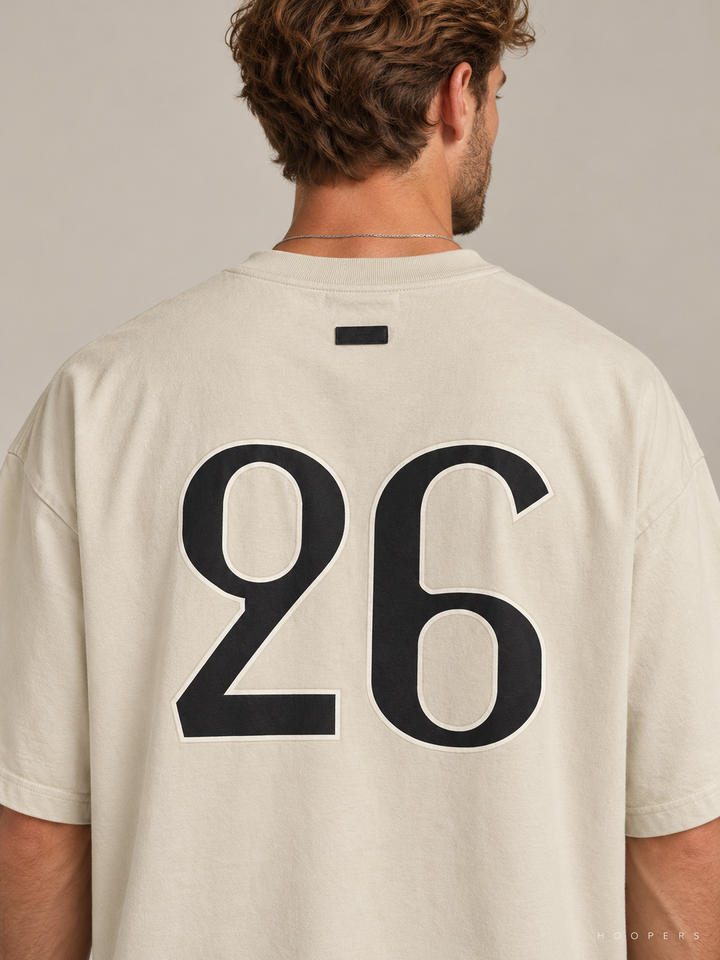 חולצת Fear of God Essentials – FG 26 שמנת – תקריב