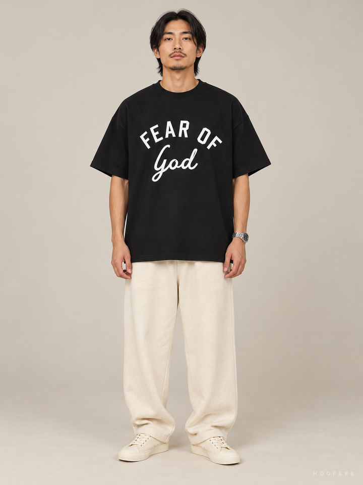 חולצת Fear of God Essentials – God Script שחור – חזית
