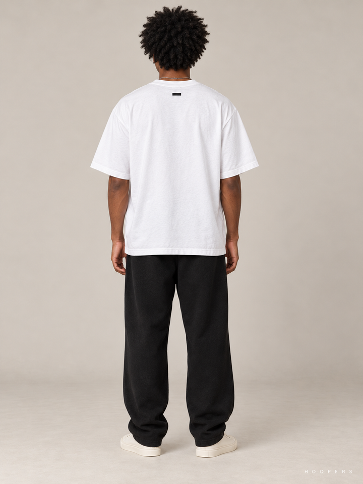 חולצת Fear of God Essentials – Script לבן – גב