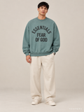 סווטשירט Fear of God Essentials – Arch Logo טורקיז מכובס | HOOPERS