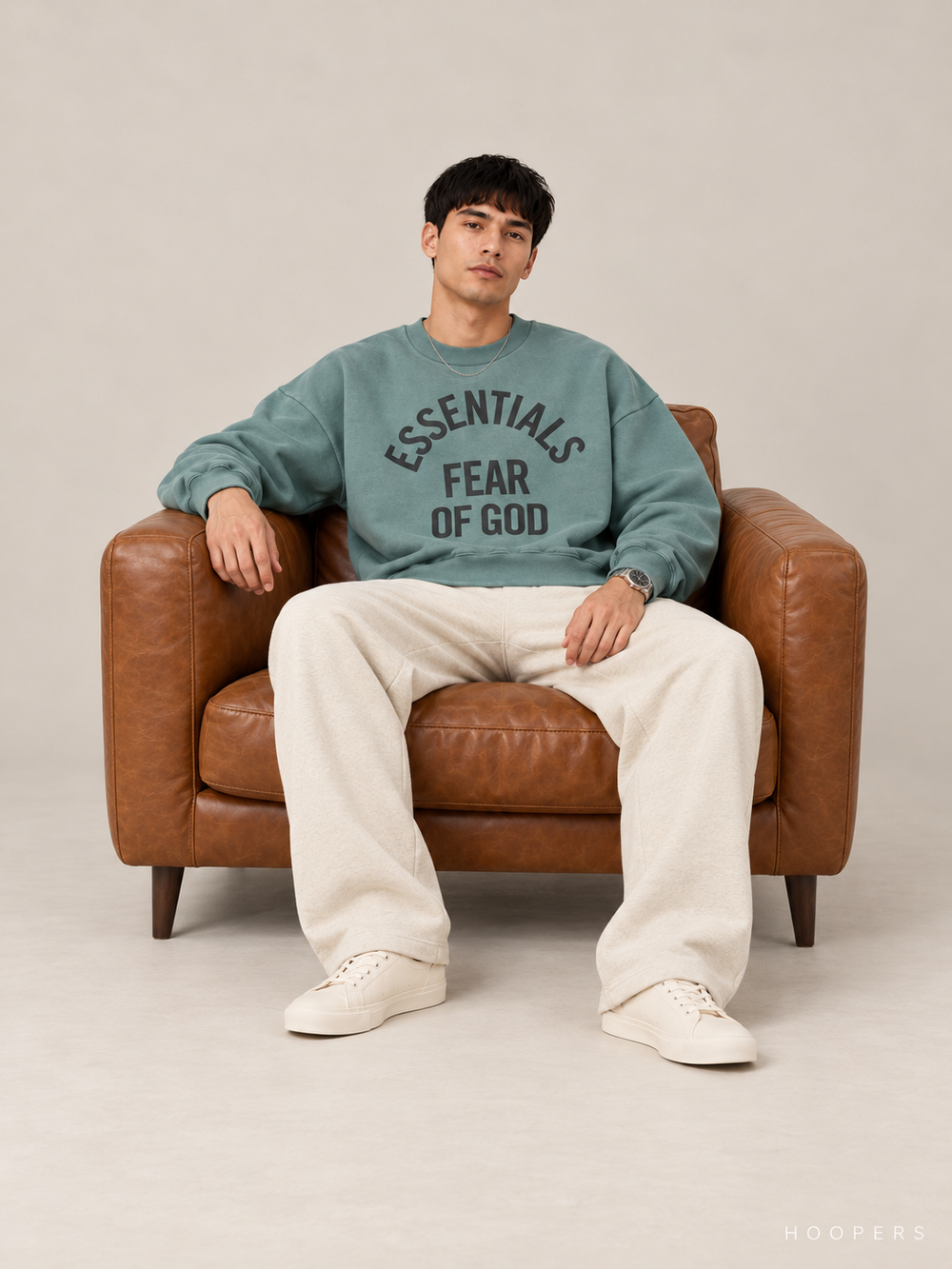 סווטשירט Fear of God Essentials – Arch Logo טורקיז מכובס | HOOPERS