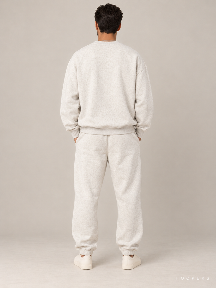 סווטשירט Fear of God Essentials – Script שמנת מלאנז' – גב