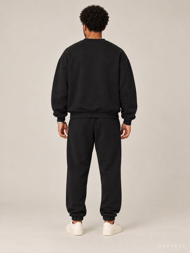סווטשירט Fear of God Essentials – Arch שחור – גב