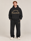 קפוצ'ון Fear of God Essentials – Big Script שחור דהוי | HOOPERS