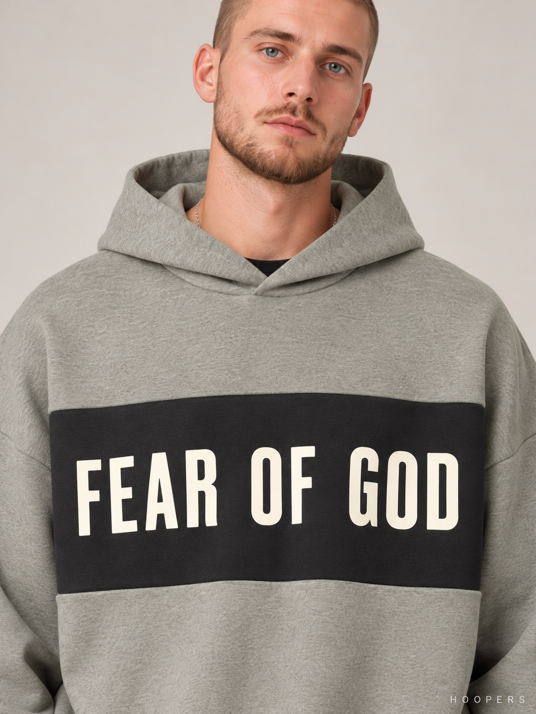 קפוצ'ון Fear of God Essentials – Band מרווה מלאנז' – תקריב