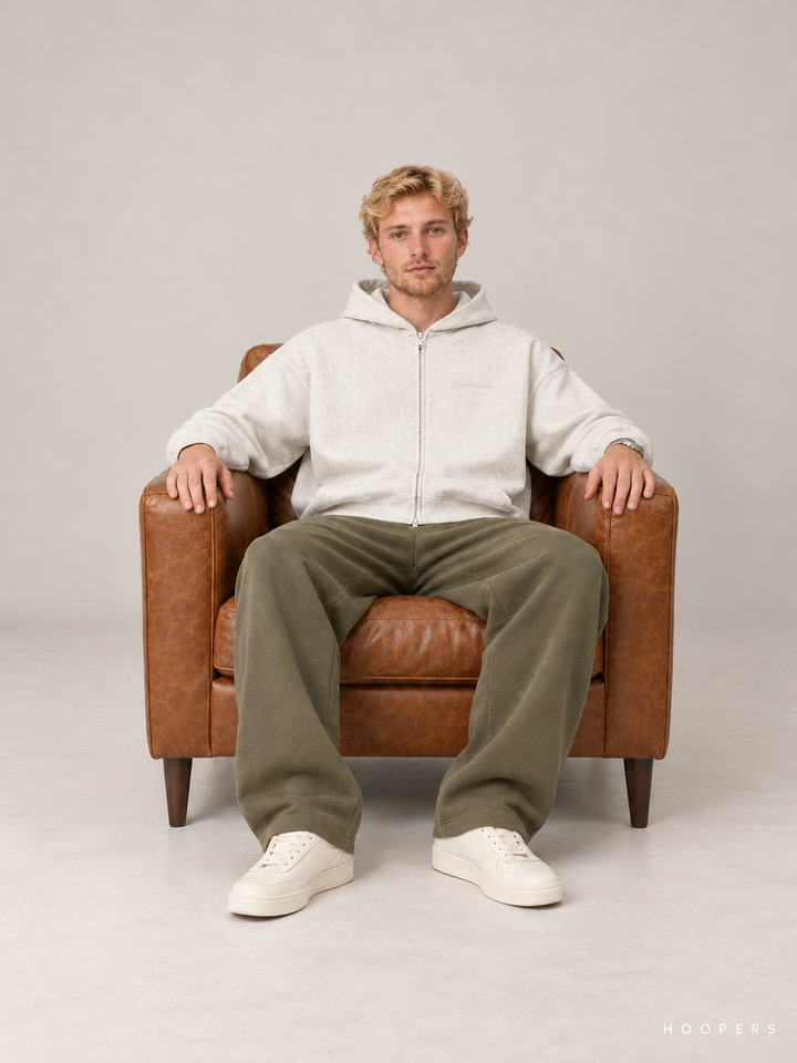 קפוצ'ון רוכסן Fear of God Essentials – Zip שמנת מלאנז' – סטודיו