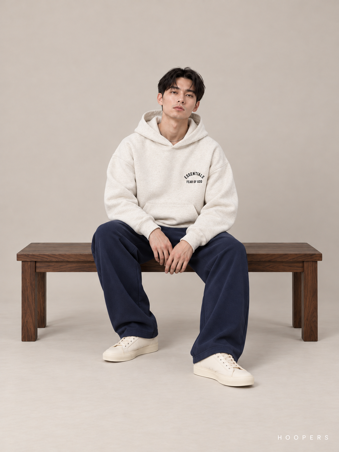 קפוצ'ון Fear of God Essentials – Mini Arch שמנת מלאנז' – סטודיו