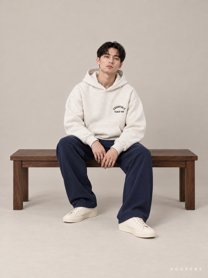קפוצ'ון Fear of God Essentials – Mini Arch שמנת מלאנז' – סטודיו