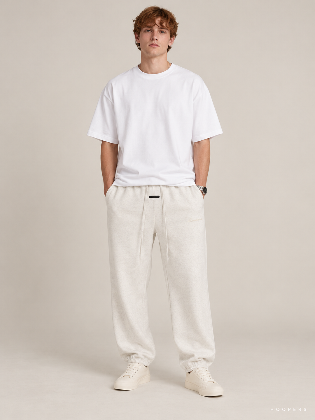 מכנס טרנינג Fear of God Essentials – Jogger שמנת מלאנז' – חזית