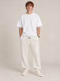 מכנס טרנינג Fear of God Essentials – Jogger שמנת מלאנז' | HOOPERS