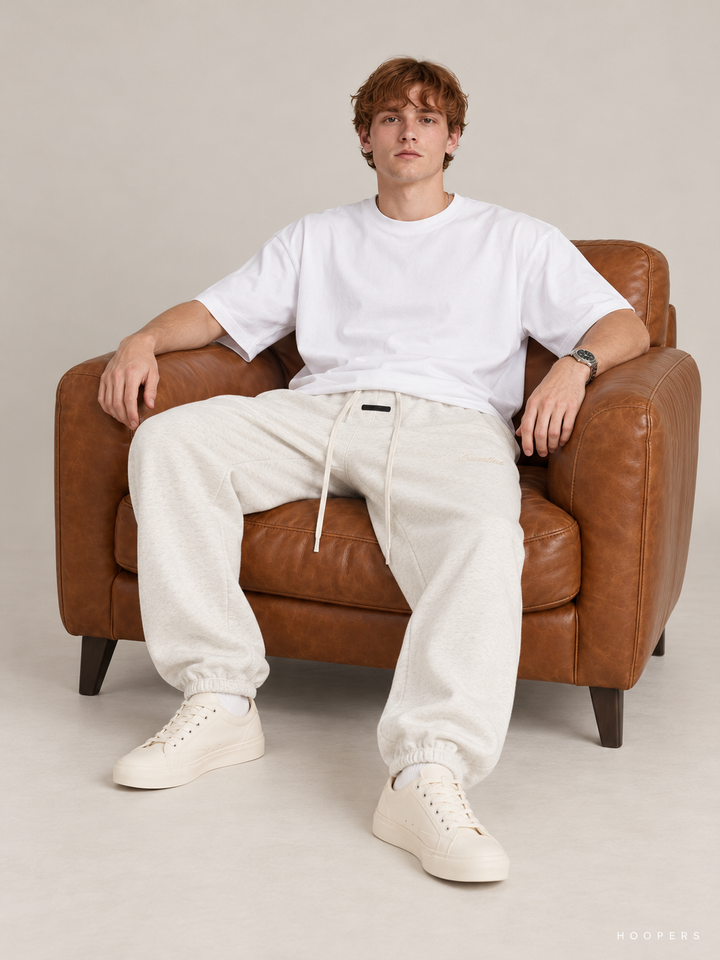 מכנס טרנינג Fear of God Essentials – Jogger שמנת מלאנז' – סטודיו