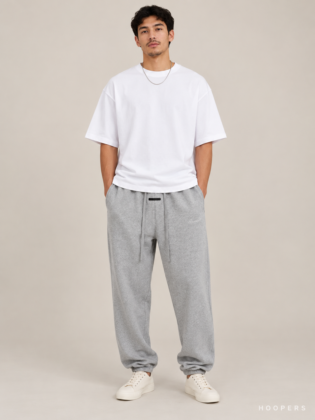 מכנס טרנינג Fear of God Essentials – Jogger אפור מלאנז' – חזית