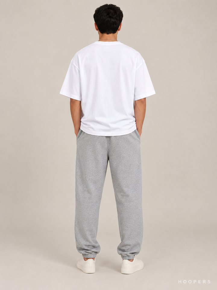 מכנס טרנינג Fear of God Essentials – Jogger אפור מלאנז' – גב