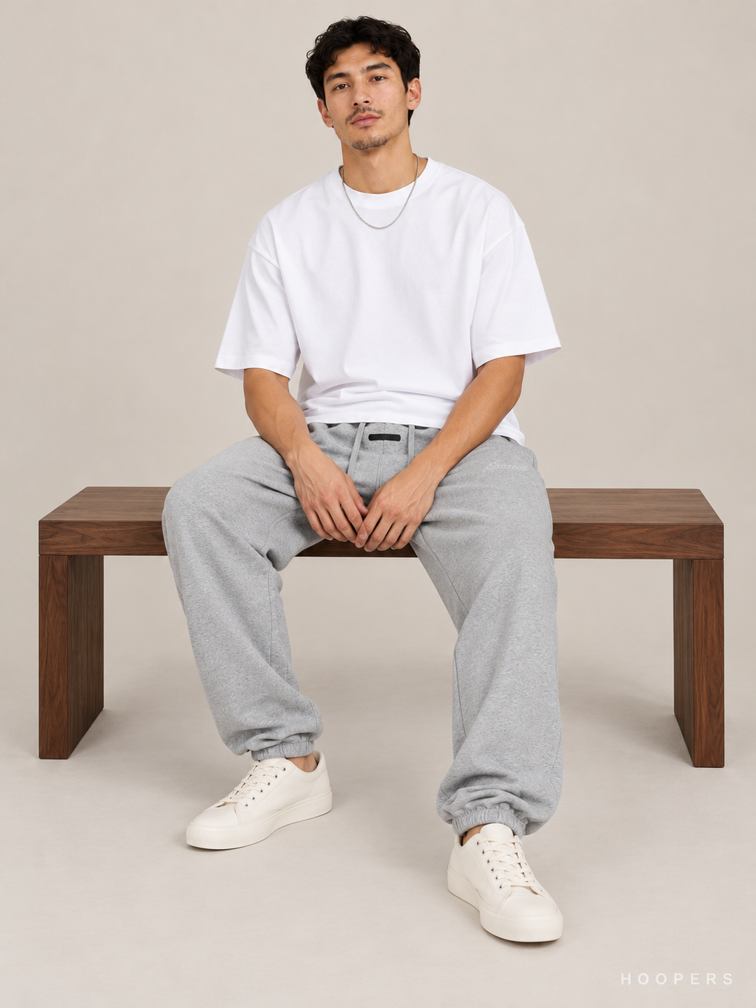 מכנס טרנינג Fear of God Essentials – Jogger אפור מלאנז' – סטודיו