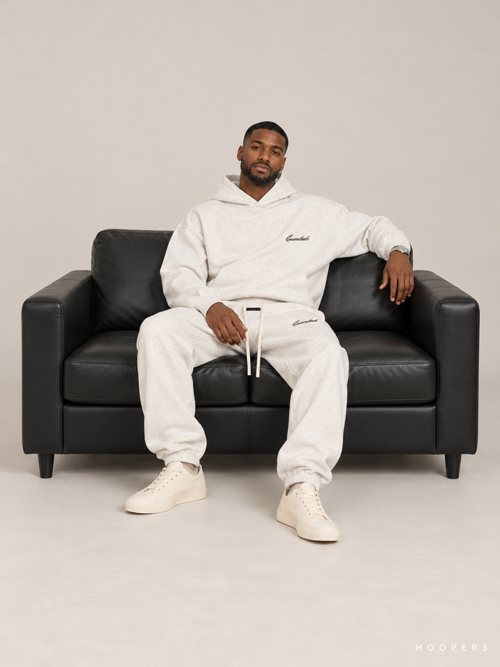 מכנס טרנינג Fear of God Essentials – Script Jogger שמנת מלאנז' – סטודיו