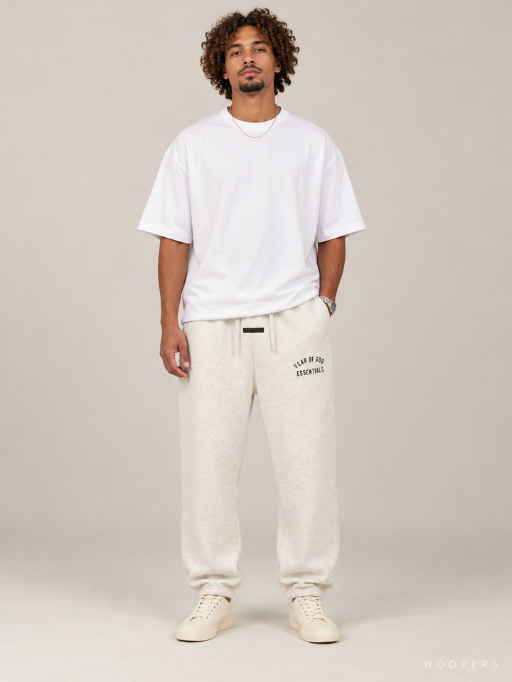 מכנס טרנינג Fear of God Essentials – Arch Jogger שמנת מלאנז' – חזית