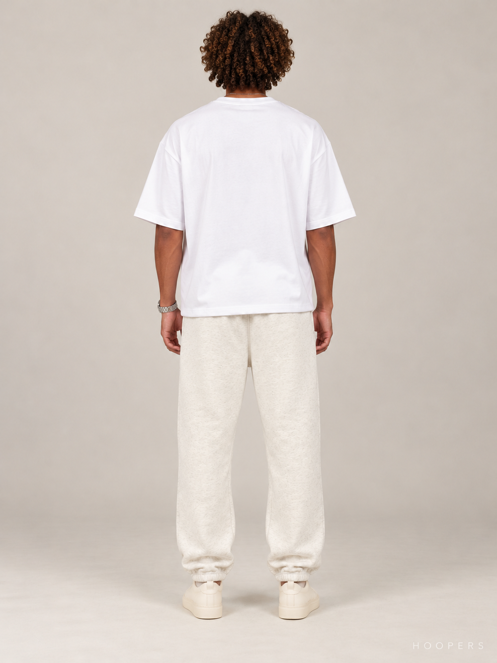 מכנס טרנינג Fear of God Essentials – Arch Jogger שמנת מלאנז' – גב