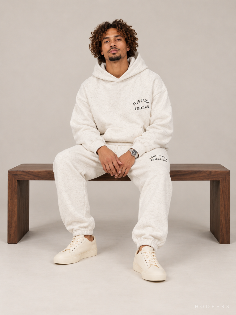 מכנס טרנינג Fear of God Essentials – Arch Jogger שמנת מלאנז' | HOOPERS